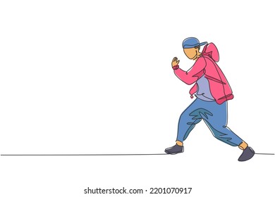 One continuous line drawing of young sporty break dancer man with tracksuit show hip hop dance style in the street. Urban lifestyle sport concept. Dynamic single line draw design vector illustration