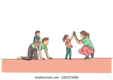 One continuous line drawing of young mother giving high five to daughter while son ride on dad's back at home. Happy family parenting concept. Dynamic single line draw design vector illustration