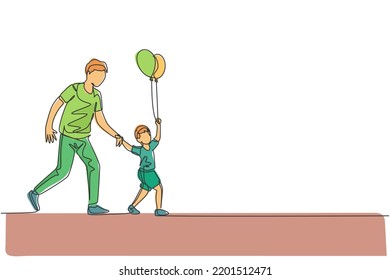 One continuous line drawing of young father and his son go to night carnival festival while the kid holding balloon. Happy family parenting concept. Dynamic single line draw design vector illustration