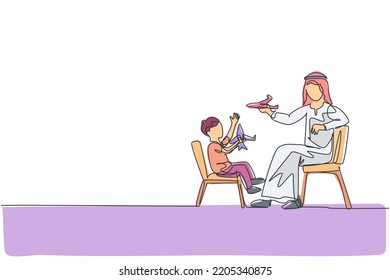 One continuous line drawing of young Arabian father playing aeroplane toy figure with son at home. Happy Islamic muslim parenting family concept. Dynamic single line draw design vector illustration