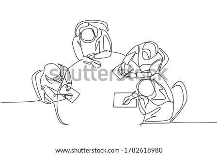 One continuous line drawing of young muslim businesspeople discussing agreement project together from top view. Islamic clothing hijb, scarf, keffiyeh. Single line draw design vector illustration