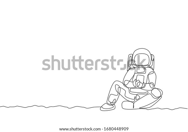 One continuous line drawing of young
spaceman on spacesuit siting relax on moon surface while texting.
Astronaut business office with deep space concept. Single line draw
design vector illustration