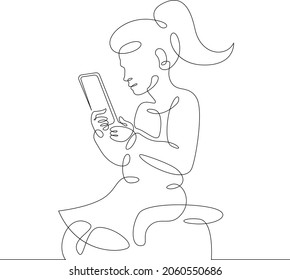 Una línea continua. Niño con smartphone.Niño jugando con el teléfono. gadget para niños.Un logotipo de línea de dibujo continua aisló una ilustración mínima.