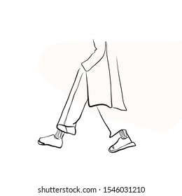 Una línea continua de piernas para caminar en pantalones y zapatillas