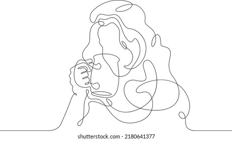 One continuous line.Woman drinking morning coffee. Girl with a cup of hot drink.One continuous line is drawn on a white background.