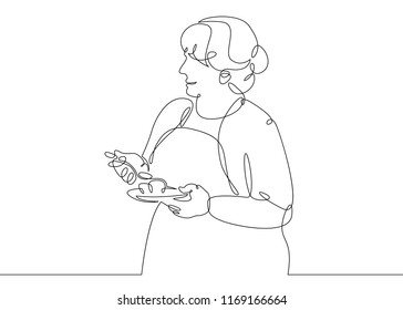 One continuous single drawn line of the doodle is the character of the cook woman. Cooking in the kitchen. Housewife at work on household chores. Food, kitchen, cook.