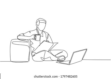 One continuous single line drawing of young happy marketing manager leaning his body to sofa ottoman while reading annual report on tablet. Drinking coffee or tea concept design vector illustration