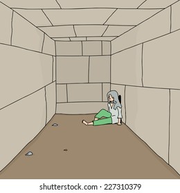 One depressed vagrant sitting on ground in corridor