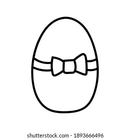 One easter egg with black bow ornament on white background. Simple Spring holiday symbols. 