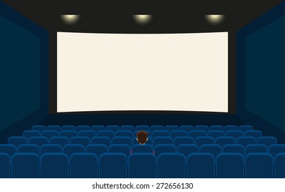 One guy watching film in the empty cinema