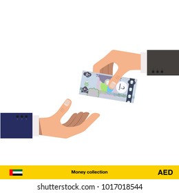 One hand gives Dirham in other hand