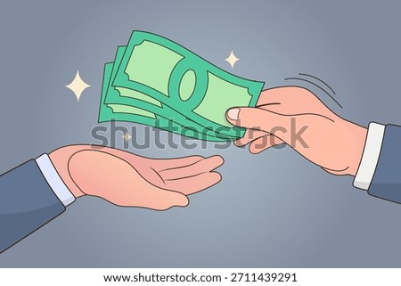 One hand giving banknotes to another hand. A concept of business payment transaction, receiving salary wage, financial loan agreement, and cash exchange deal.