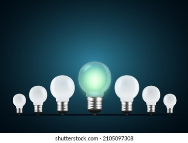 One LED Light bulb glows stand out from all in the dark with a green tone. Concept illustration about outstanding, choose, and winning.