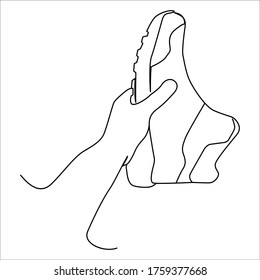 one line continuous drawing left hand holding a shoe upward