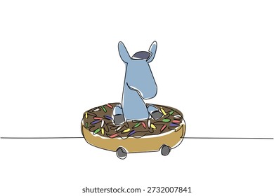 Un dibujo de línea del burro adorable para el concepto de la comida presenta el animal lindo juguetón que se sienta dentro de la rosquilla vidriada. Gráfico colorido para el propósito del cartel de la pared del vivero con el mamífero encantador del ganado agrícola