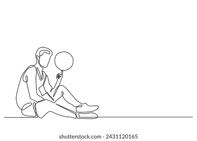 one line drawing of basketball athlete sitting and spinning the ball with fingers. vector of continuous lines rotating the ball with the finger. isolated white background