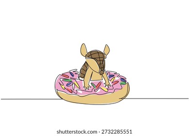Un dibujo de línea de armadillo blindado marrón para el concepto de bocadillo presenta un adorable animal lindo sentado dentro de una rosquilla acristalada. El arte colorido representa el propósito de la decoración de la pared de los niños con una criatura mamífero juguetona