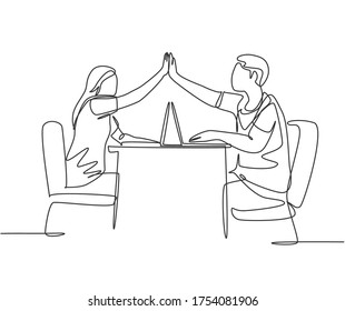 One line drawing of two young happy couple man and woman work at cafe and giving high five gesture to celebrate successful. Business deal concept continuous line draw design vector illustration