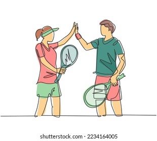 One line drawing of young fun couple male and female playing tennis at grass court together and giving high five gesture. Relationship concept continuous line draw graphic design vector illustration