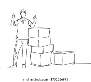 One line drawing of young happy delivery man thumbs up while lift up and deliver carton box packages to customer. Delivery service business concept. Continuous line draw design vector illustration