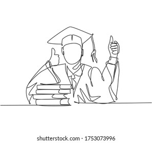 One line drawing of young happy graduate male college student wearing graduation uniform and giving thumbs up gesture in front of books stack. Education concept continuous line draw design vector