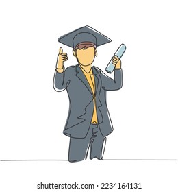 One line drawing of young happy boy student wearing graduation hat and giving thumbs up gesture while holding graduation paper roll. Education concept continuous line draw design vector illustration