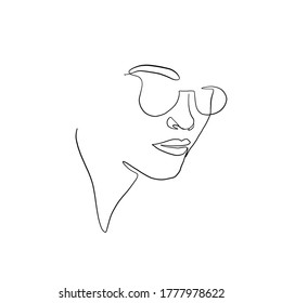 One line woman in sunglasses. Fashionable typography girl in minimalist style. Beauty sign. Attractive fashion model. 