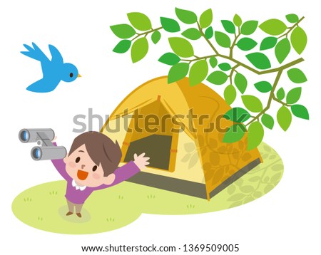 One little boy use binoculars watching bird in nature