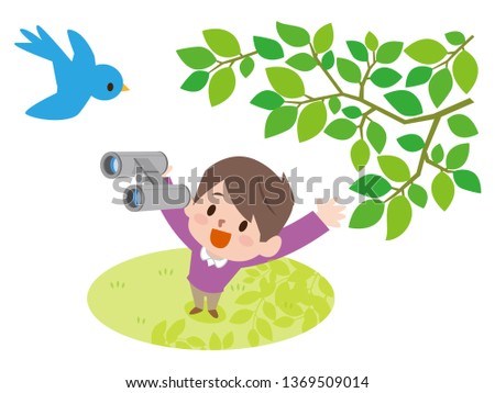 One little boy use binoculars watching bird in nature