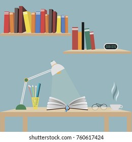 One open book on the table. The light of a table lamp is for a book. A cup of coffee.