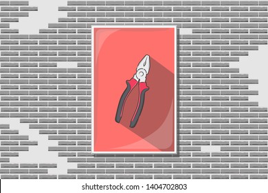 One picture of new metal pliers with rubber or plastic handle of red and black colors and long shadow in rectangular frame with glass on old broken bricks wall