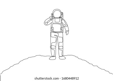 One single line drawing of cosmonaut calling his partner using smartphone in moon surface vector illustration. Astronaut business office with outer space concept. Modern continuous line draw design