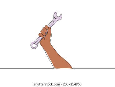 One single line drawing of man holding stainless steel wrench key. Mechanic and handyman tools concept. Continuous line draw vector design illustration