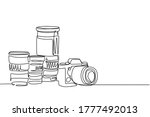 One single line drawing of old retro analog slr camera with set of telephoto and wide lenses. Vintage classic photography equipment concept continuous line draw design vector graphic illustration