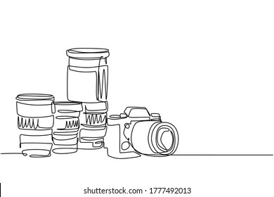 One single line drawing of old retro analog slr camera with set of telephoto and wide lenses. Vintage classic photography equipment concept continuous line draw design vector graphic illustration