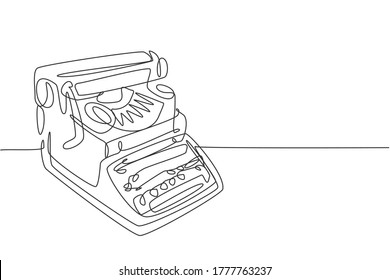 One single line drawing of retro old classic typewriter set from side view. Vintage office item concept continuous line draw graphic design vector illustration