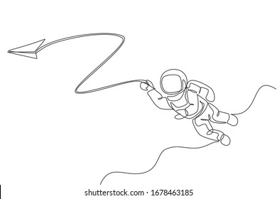 One single line drawing space man astronaut exploring cosmic galaxy, playing with paper plane graphic vector illustration. Fantasy outer space life fiction concept. Modern continuous line draw design