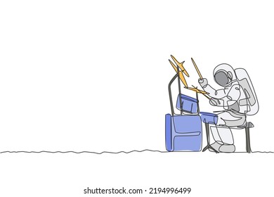 One single line drawing of spaceman drummer playing drum set musical instrument on moon surface vector illustration. Music concert poster, space astronaut concept. Modern continuous line draw design