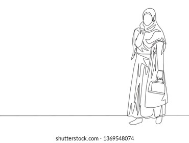 One single line drawing of young happy muslimah bringing little bag and go to shopping. Beautiful Asian woman model in trendy hijab fashion concept continuous line draw design vector illustration