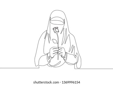 One single line drawing of young attractive Asian muslimah wearing burqa and holding rose flower. Traditional beauty Arabian woman niqab cloth concept continuous line draw design vector illustration