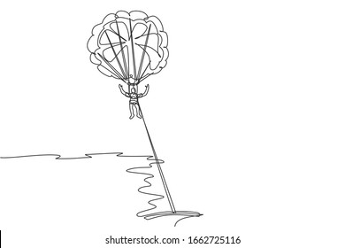 One single line drawing of young sporty man flying with parasailing parachute on the sky pulled by boat graphic vector illustration. Extreme sport concept. Modern continuous line draw design