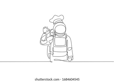 One single line drawing of young astronaut chef giving okay taste gesture for delicious food vector illustration. Delicious space galaxy dish concept. Modern continuous line draw design graphic