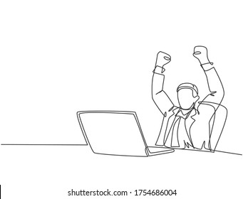 One single line drawing of young happy male manager sitting on chair and clenched fist raised in the air in front of computer. Success business deal concept continuous line draw design illustration