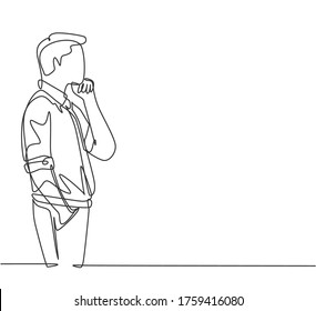 One single line drawing of young male worker seriously staring out of the window from the office building. Focus thinking on company growth concept.  Continuous line draw design vector graphic illustration