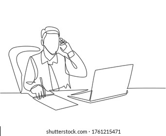 One single line drawing of young male employee holding smartphone while writing report on paper and reading business report on laptop. Business concept continuous line draw design vector illustration