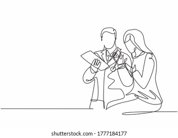 One single line drawing of young male doctor giving a consultation session to female patient while reading medical record. Medical health care concept continuous line draw design vector illustration