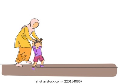 One single line drawing of young Arabian mother holding her son's hand, teaching how to walk vector illustration. Happy Islamic muslim family parenting concept. Modern continuous line draw design