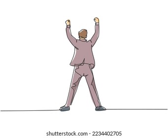One single line drawing of young happy business man standing and fist his hands to the air to celebrate his success, back view. Business deal concept continuous line draw design vector illustration