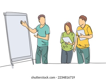 One single line drawing of young happy startup members discussing company growth and writing at flip chart. Business presentation concept continuous line graphic draw design vector illustration