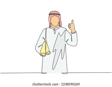 One single line drawing of young happy muslim architect bring building floor plan while thumb up. Saudi Arabia cloth shmag, kandora, headscarf, thobe. Continuous line draw design vector illustration